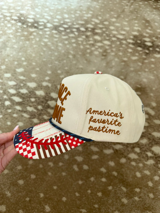 Baseball cap with 'America's favorite pastime' text on a patterned background