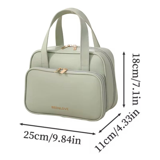 Green handbag with dimensions labeled on a white background