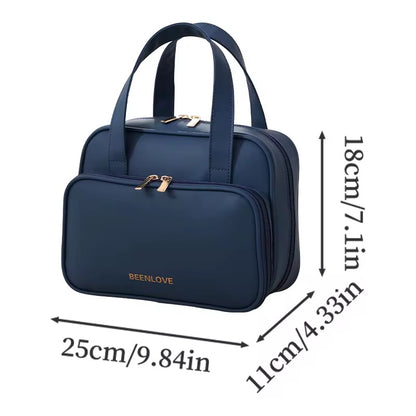 Navy blue handbag with gold accents and dimensions on a white background