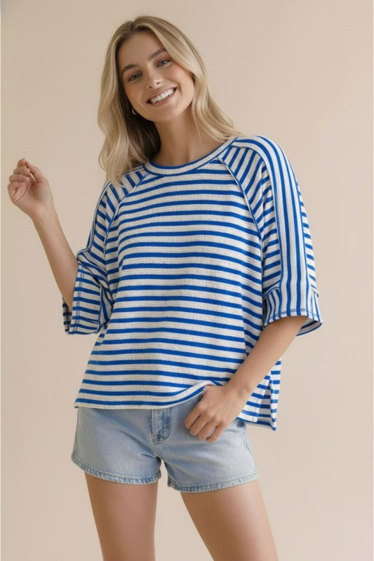 Blue and white striped oversized knit top